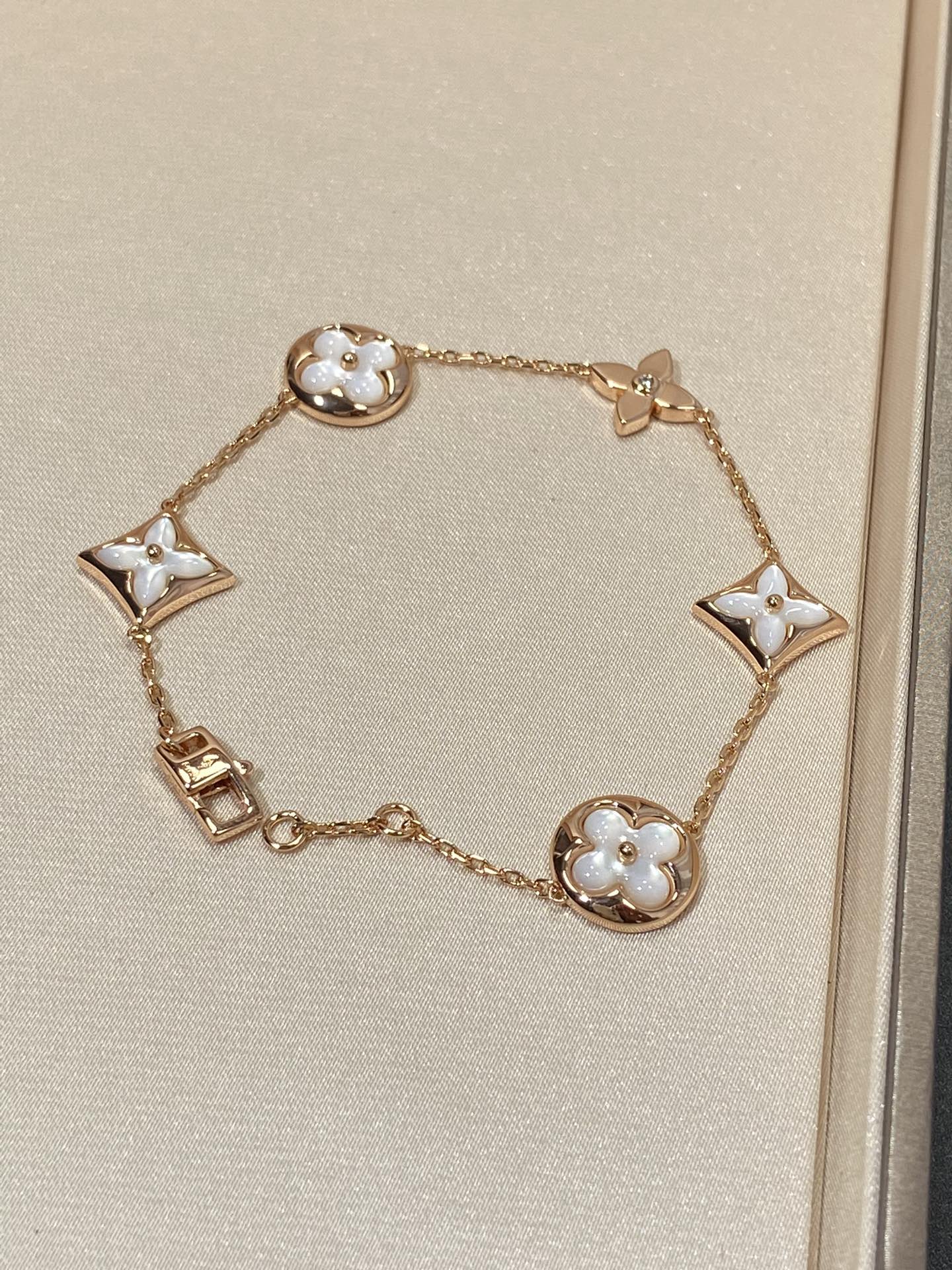 [BLUE TEARS]STAR AND SUN 5 MOTIF MOP PINK GOLD BRACELET