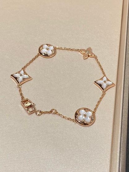[BLUE TEARS]STAR AND SUN 5 MOTIF MOP PINK GOLD BRACELET
