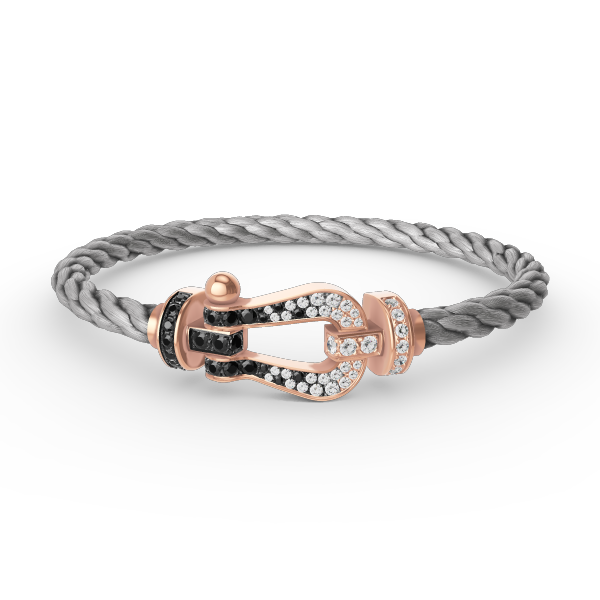 [BLAUE TRÄNEN]FORCE GROSSES HUFEISENARMBAND MIT SCHWARZEN WEISSEN DIAMANTEN UND ROSÉGOLD