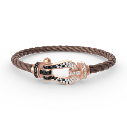 [BLAUE TRÄNEN]FORCE GROSSES HUFEISENARMBAND MIT SCHWARZEN WEISSEN DIAMANTEN UND ROSÉGOLD